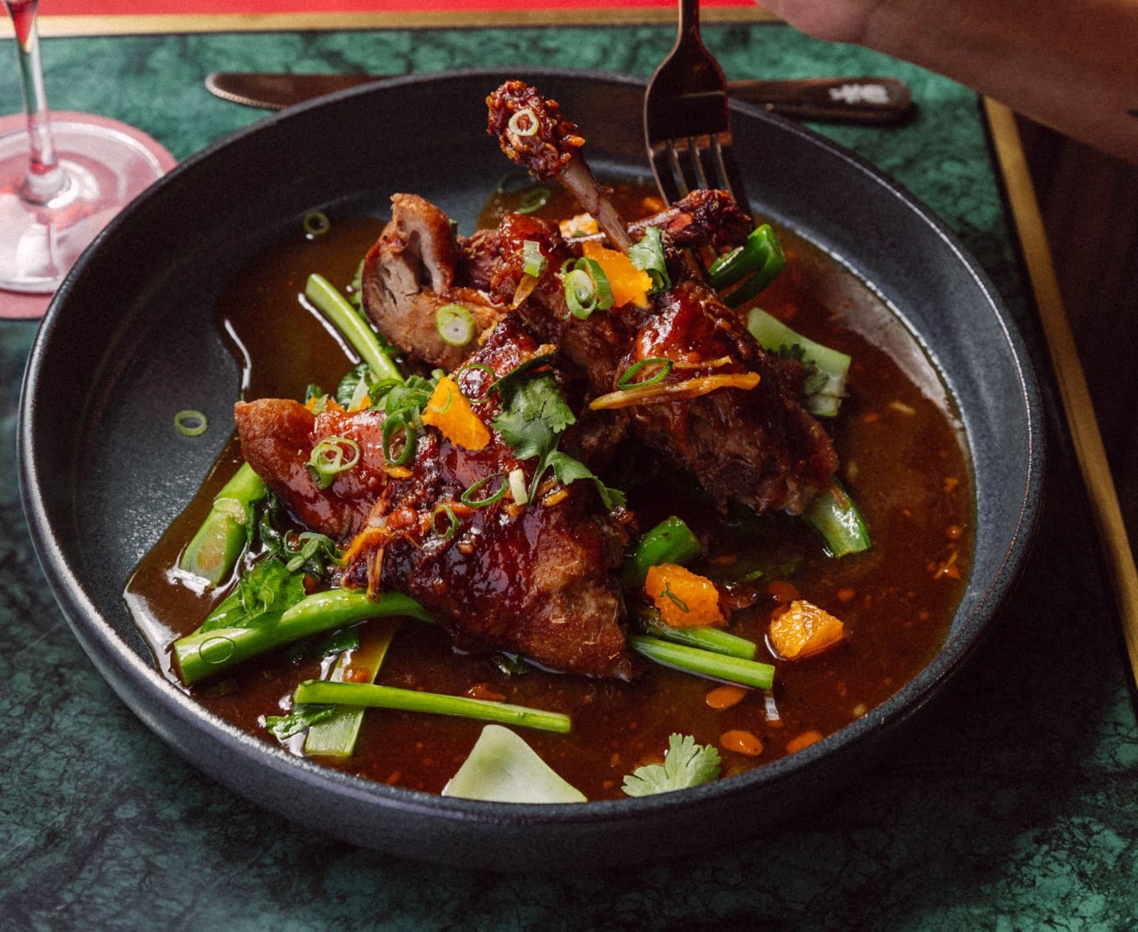 Half Peking duck with mandarin and greens